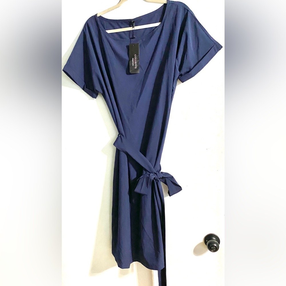 Navy Blue Short Sleeve Dress With Pockets
Size: 5XL Brand: Cocoepps
Tag On